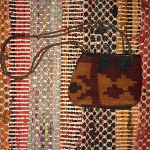 Vegan leather and stitched burlap bucket bag